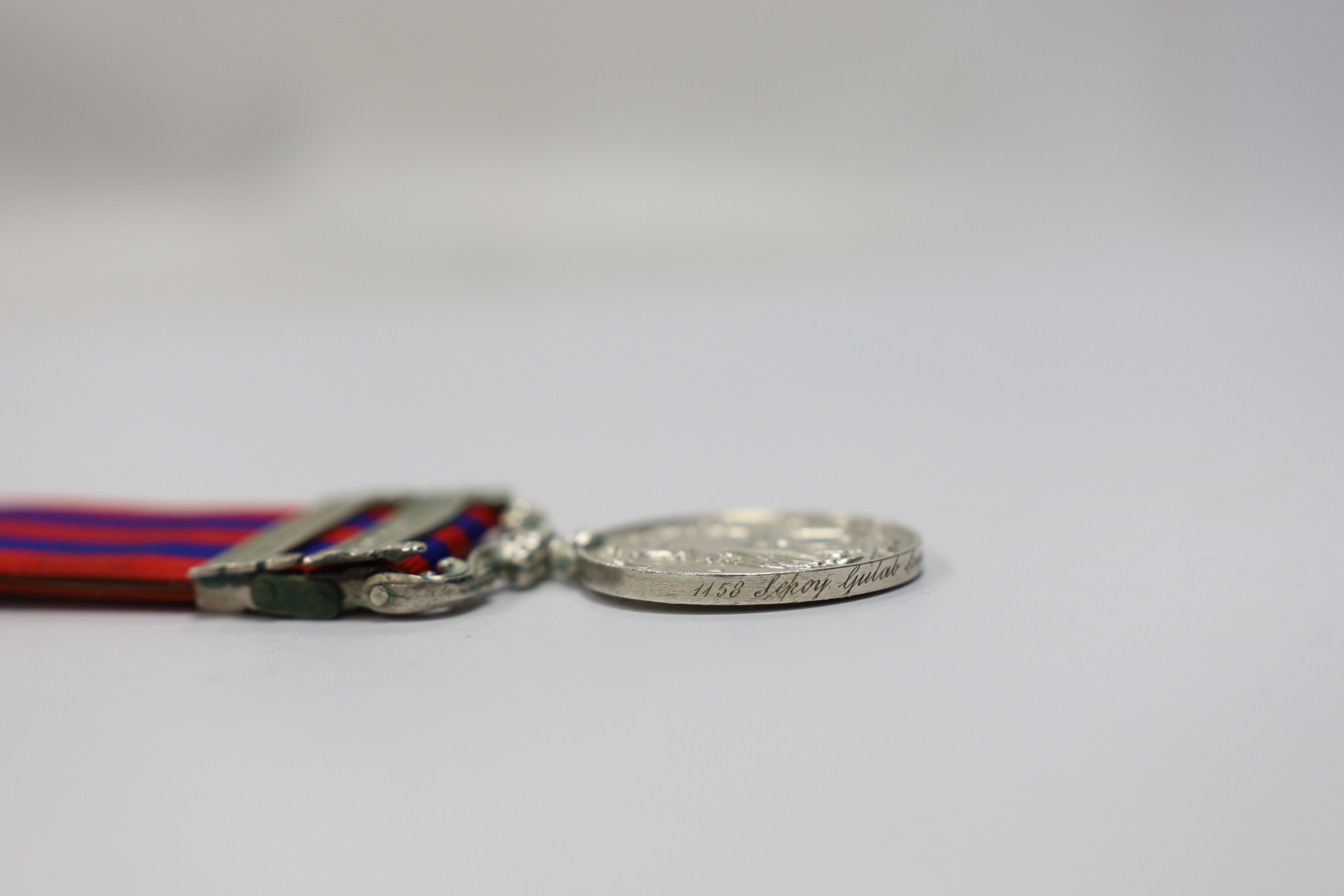 An India General Service Medal with Waziristan 1894-5 and Hazara 1888 clasps to 1158 Sepoy Gulab Singh 14th Bt Infy